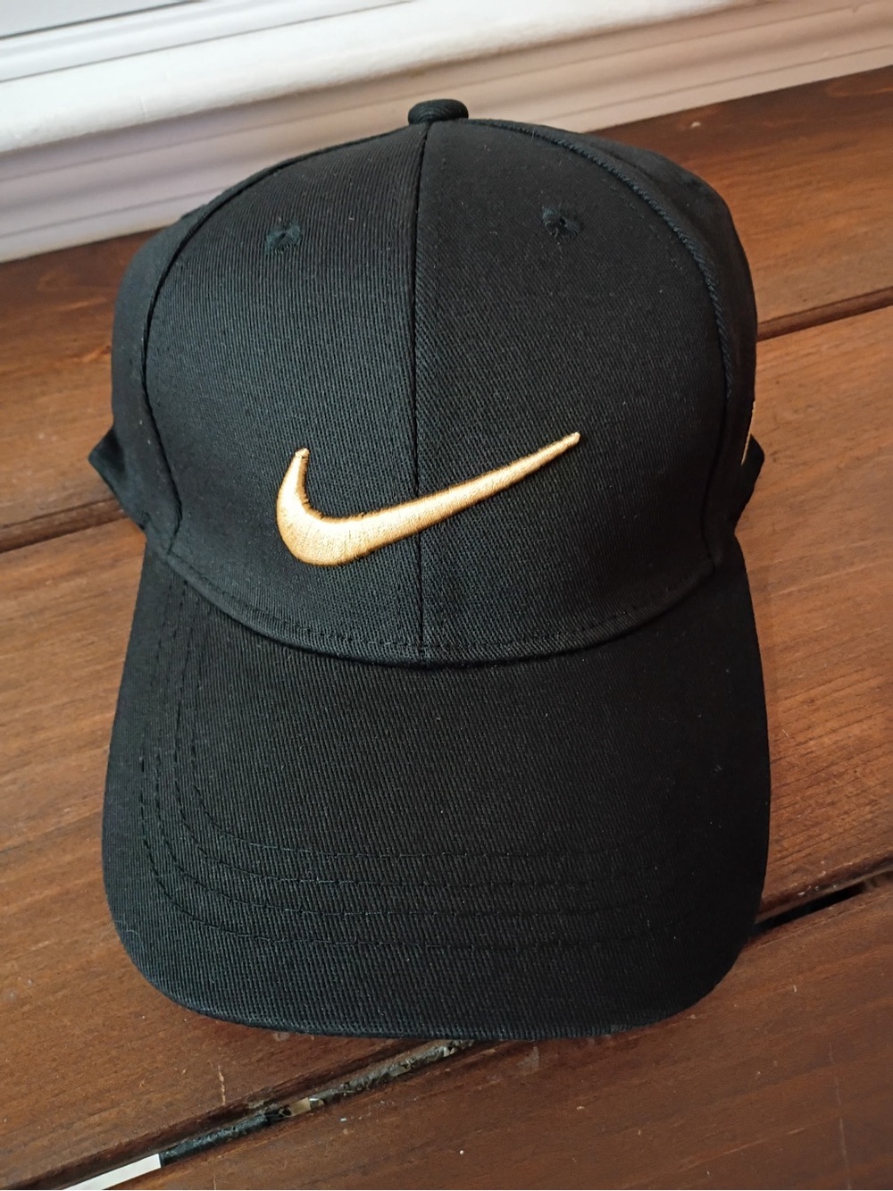 Nike Black Baseball Cap with Gold Swoosh